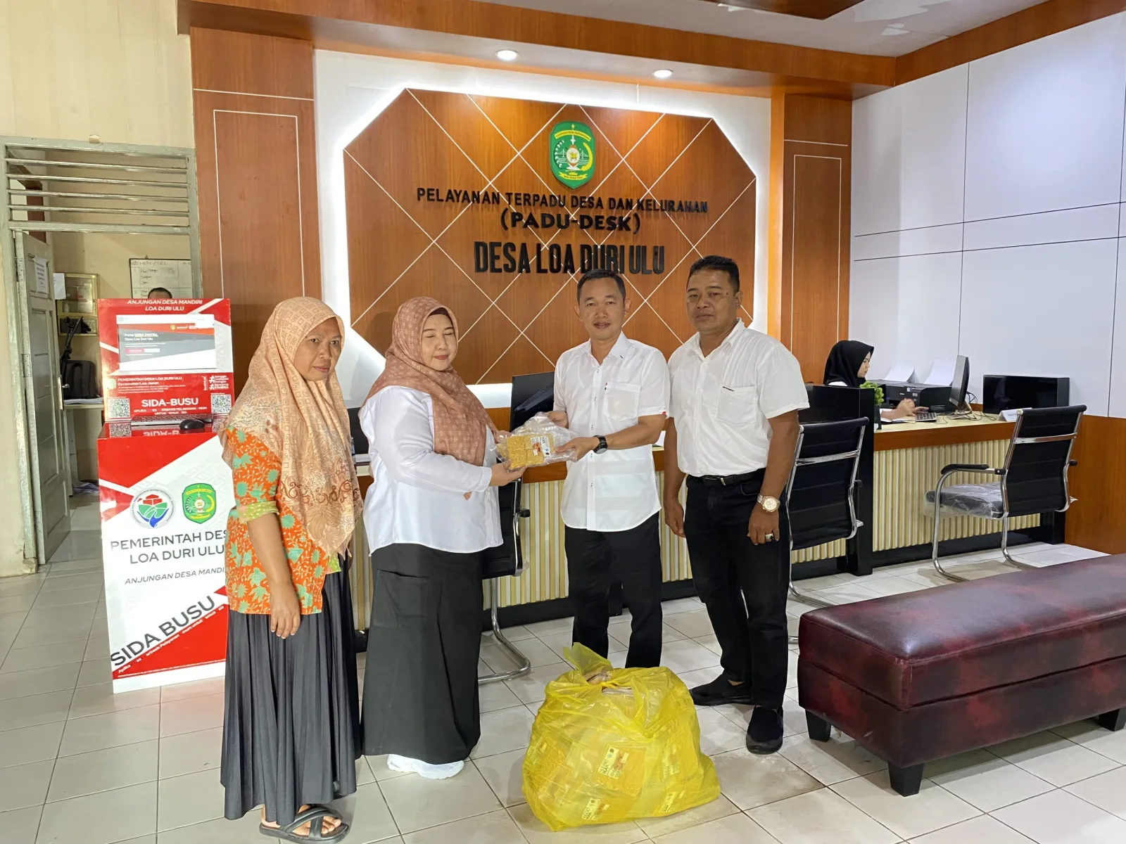 Penyarahan Bantuan Nugget dari Dinas Perikanan Kab. Kukar kepada Posyandu Melati